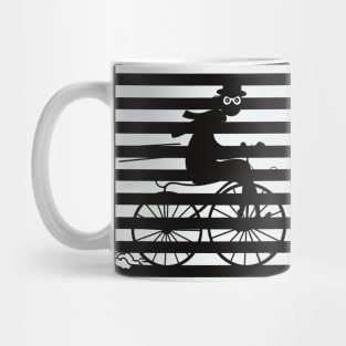 Black and white striped pattern with a shady cyclist running fast on an old bicycle Mug